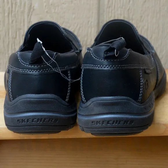 Men slip on Skechers shoes in Black