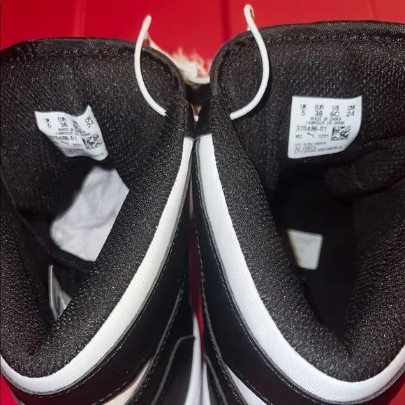Puma Black and White Sneakers